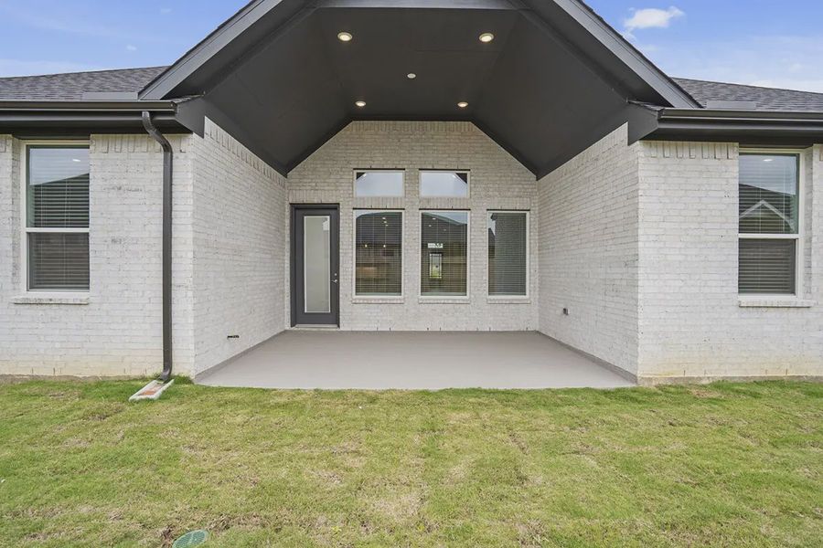 Exterior details and patio area of a home in Attwater 65's, Waller (Image 3).