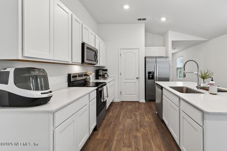 Furnished interior view inside a new home in Cross Creek Express, Green Cove Springs (Image 6).