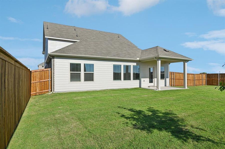 Exterior details and patio area of a home in Lakehaven - Signature Series, Farmersville (Image 3). Exterior details and patio area of a home in Lakehaven - Signature Series, Farmersville (Image 3).