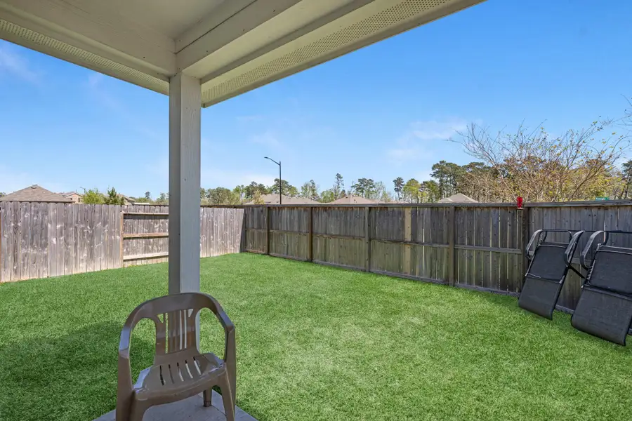 Exterior details and patio area of a home in Moran Ranch, Willis (Image 4).