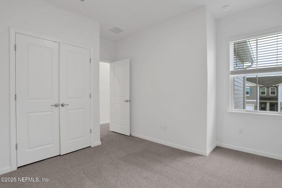 Spacious, unfurnished interior of a new home in Silver Landing at SilverLeaf, St. Augustine (Image 17).