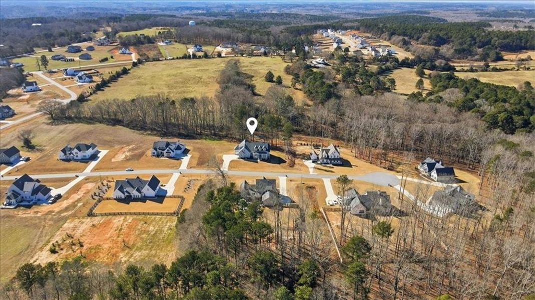 Front exterior of a new home in Old Town Estates, Dacula, GA, highlighting curb appeal (Image 30). Front exterior of a new home in Old Town Estates, Dacula, GA, highlighting curb appeal (Image 30).