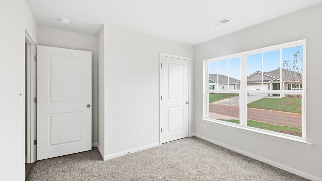 Spacious, unfurnished interior of a new home in Lakestone, Woodruff (Image 18).