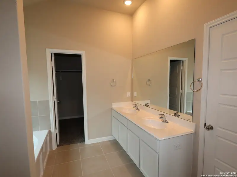 Furnished interior view inside a new home in Meadows at Clear Springs, New Braunfels (Image 17).