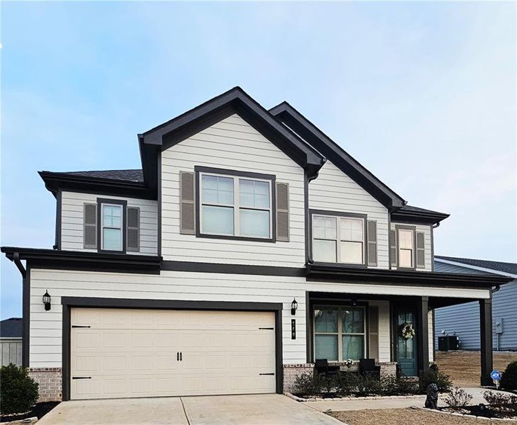 Front exterior of a new home in , Homer, GA, highlighting curb appeal (Image 30).