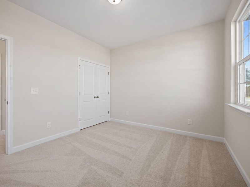 Spacious, unfurnished interior of a new home in Forestville Yard, Knightdale (Image 31).