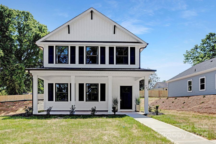 Front exterior of a new home in , Dallas, NC, highlighting curb appeal (Image 1). Front exterior of a new home in , Dallas, NC, highlighting curb appeal (Image 1).