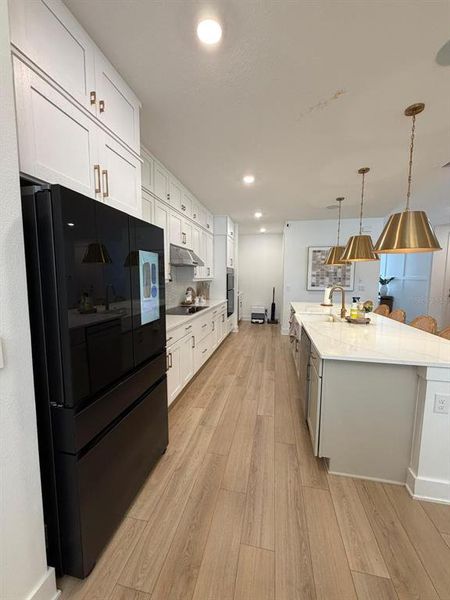 Furnished interior view inside a new home in , Winter Garden (Image 13).