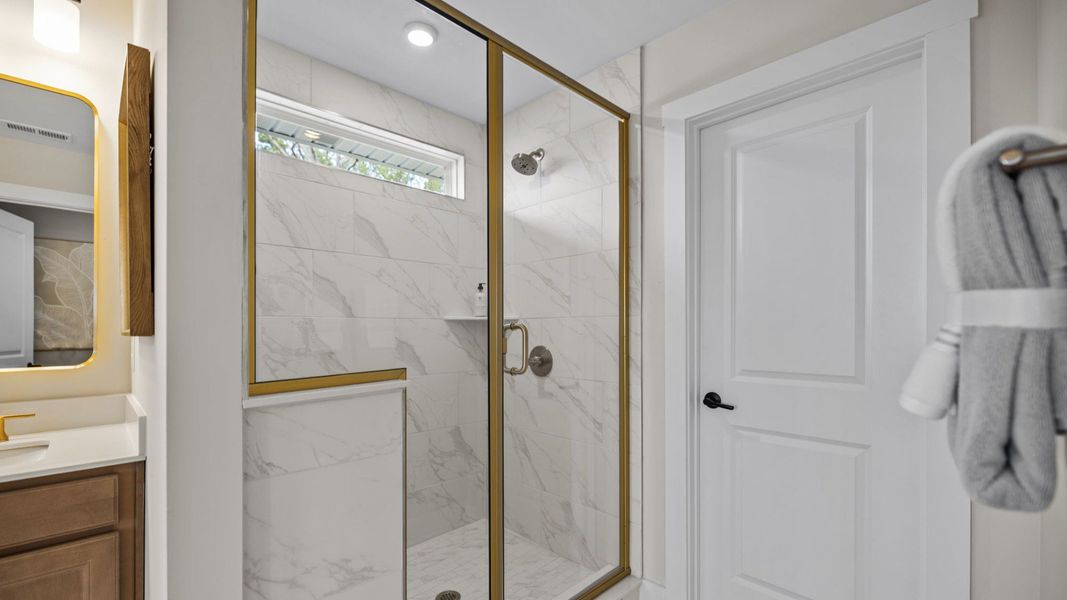 The Stonefield Home Plan in Michaux Garden by DRB Homes in Belmont, NC. - Primary Bathroom