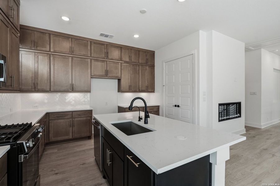 Furnished interior view inside a new home in Centero at Stone Oak, San Antonio (Image 10).