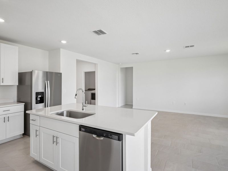 Furnished interior view inside a new home in The Reserve at Van Oaks, Auburndale (Image 6).