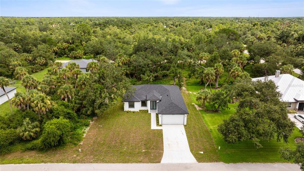 Front exterior of a new home in , Port Charlotte, FL, highlighting curb appeal (Image 2).
