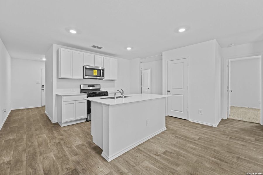 Furnished interior view inside a new home in Avenida, Converse (Image 8).