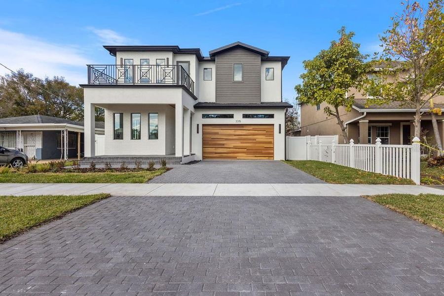 Front exterior of a new home in , Tampa, FL, highlighting curb appeal (Image 1). Front exterior of a new home in , Tampa, FL, highlighting curb appeal (Image 1).