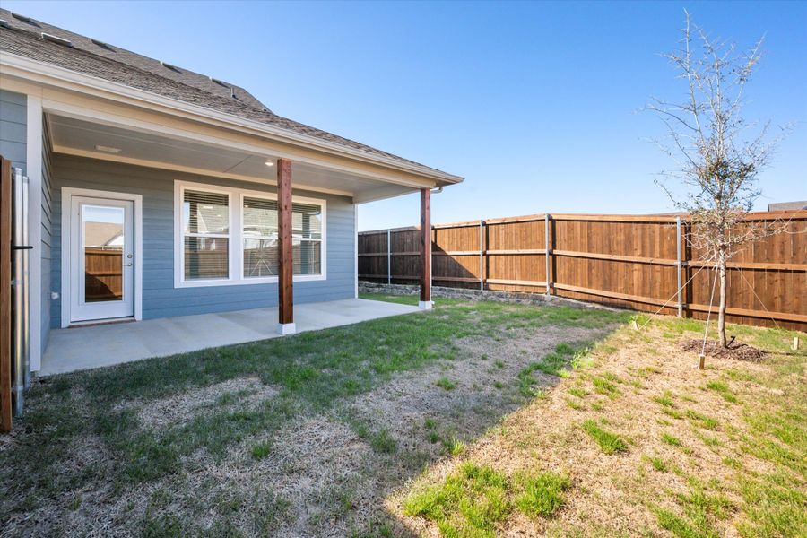 Exterior details and patio area of a home in Heritage Towne, Midlothian (Image 31).
