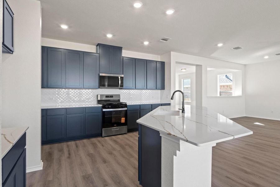 Furnished interior view inside a new home in Salerno - Classic Collection, Round Rock (Image 13). Furnished interior view inside a new home in Salerno - Classic Collection, Round Rock (Image 13).