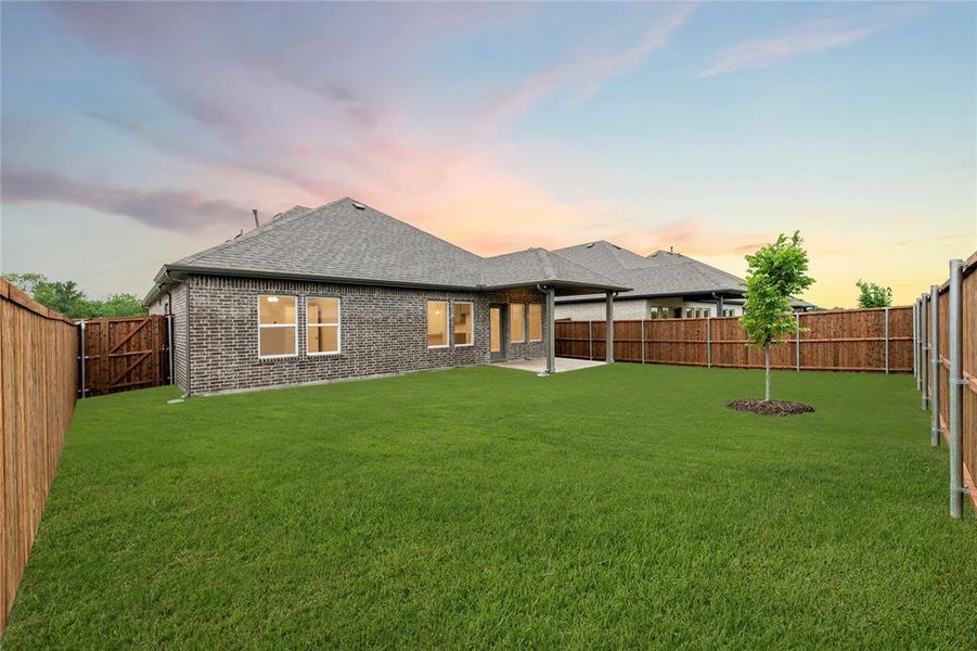 Exterior details and patio area of a home in Creekside, Royse City (Image 4).