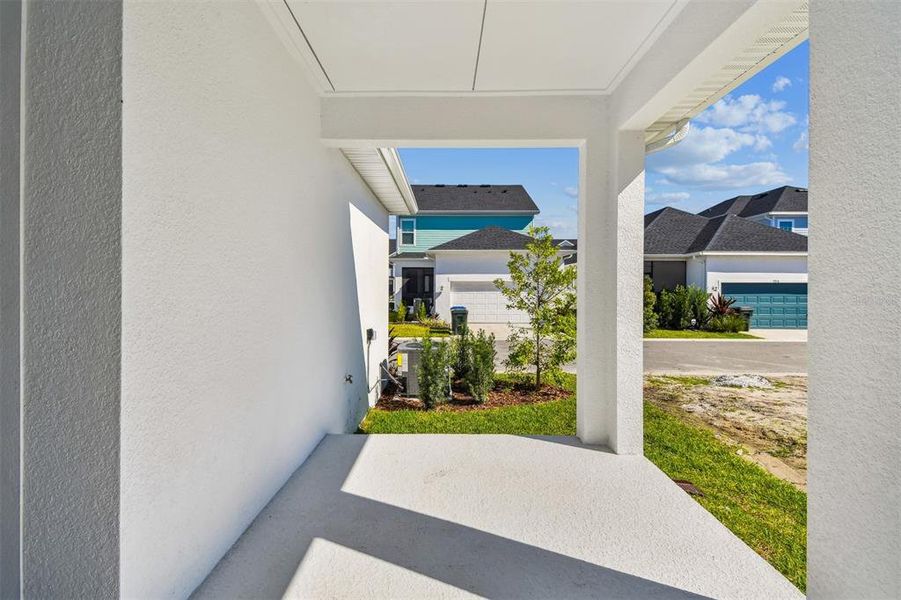 Exterior details and patio area of a home in Emerald Landing at Waterside at Lakewood Ranch – Cottage Series, Sarasota (Image 3).