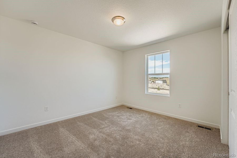 Spacious, unfurnished interior of a new home in Ken-Caryl Ranch: The Pioneer Collection, Littleton (Image 11). Spacious, unfurnished interior of a new home in Ken-Caryl Ranch: The Pioneer Collection, Littleton (Image 11).