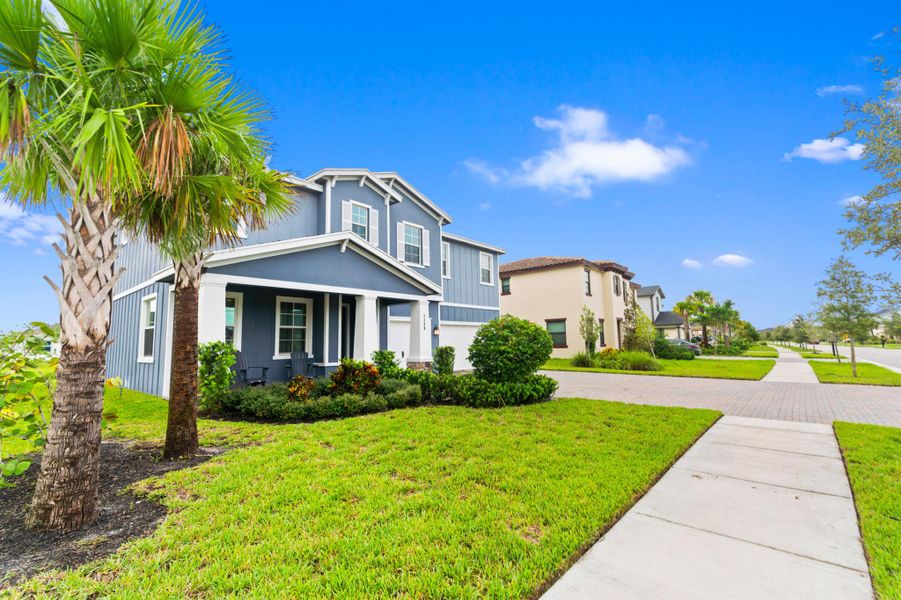 Front exterior of a new home in , Loxahatchee, FL, highlighting curb appeal (Image 20).