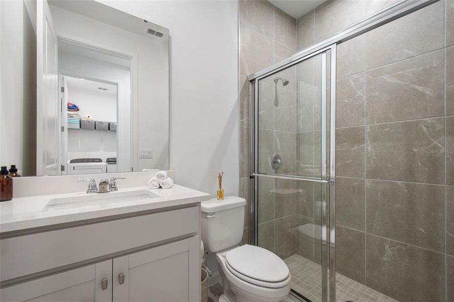 Furnished interior view inside a new home in Waterbrooke, Clermont (Image 15).
