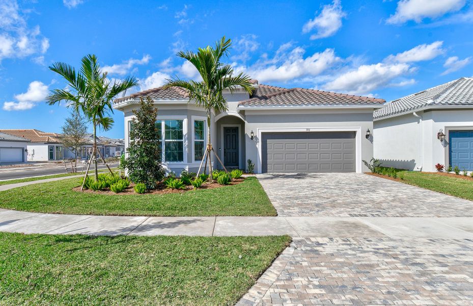 Representative exterior photo of a completed home built from the Palmary by Pulte Homes in Highpointe, Stuart, FL (Image 19).