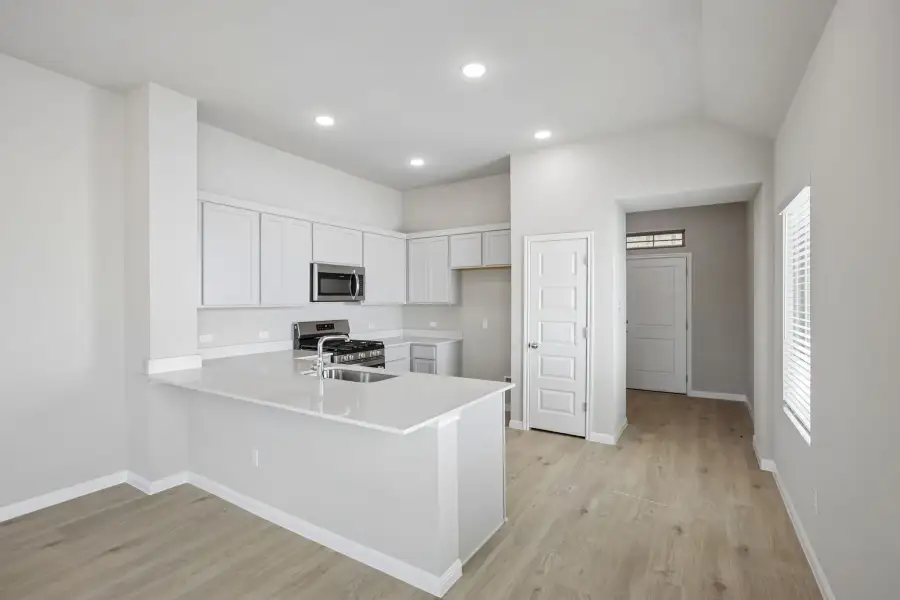 Furnished interior view inside a new home in Trinity Ranch, Elgin (Image 6).