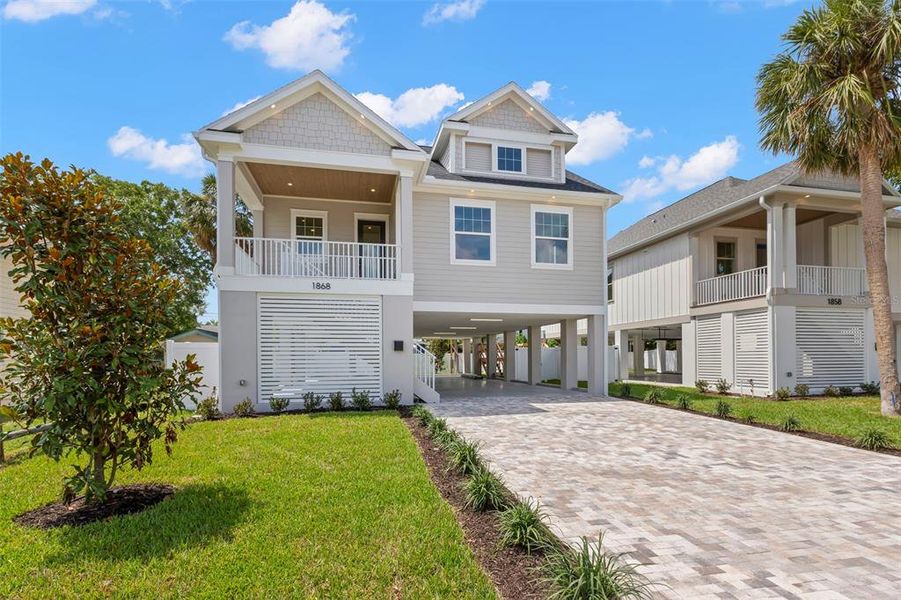 Front exterior of a new home in , St. Petersburg, FL, highlighting curb appeal (Image 2). Front exterior of a new home in , St. Petersburg, FL, highlighting curb appeal (Image 2).