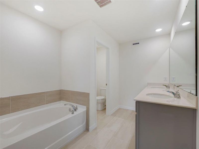 Furnished interior view inside a new home in Towns at Riverwalk, Sanford (Image 21). Furnished interior view inside a new home in Towns at Riverwalk, Sanford (Image 21).