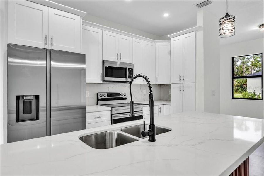 Furnished interior view inside a new home in , Port Charlotte (Image 9).