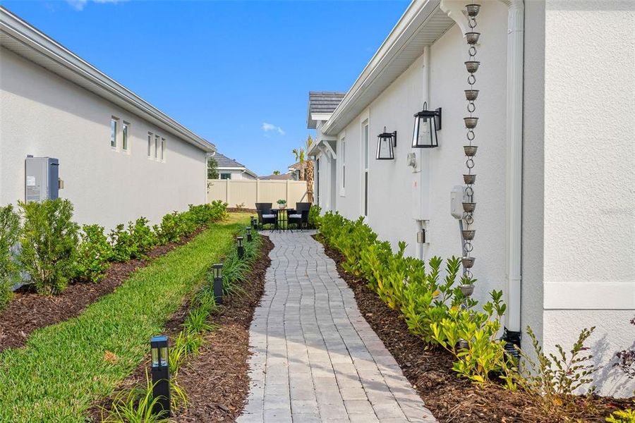 Exterior details and patio area of a home in Esplanade at Wiregrass Ranch, Wesley Chapel (Image 22).