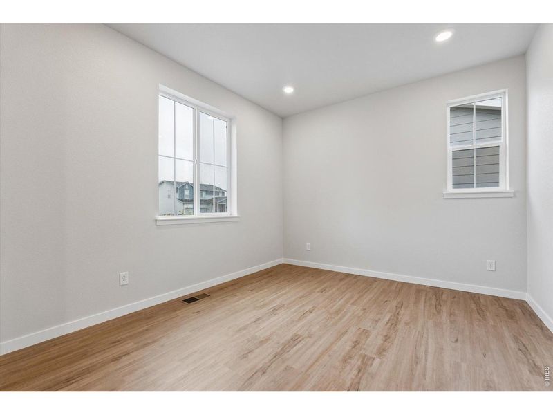 Spacious, unfurnished interior of a new home in Prairie Song, Windsor (Image 17).