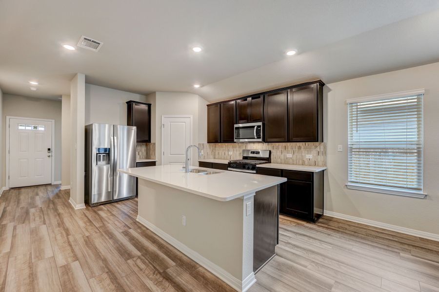 Cook a delicious meal in this beautiful kitchen.