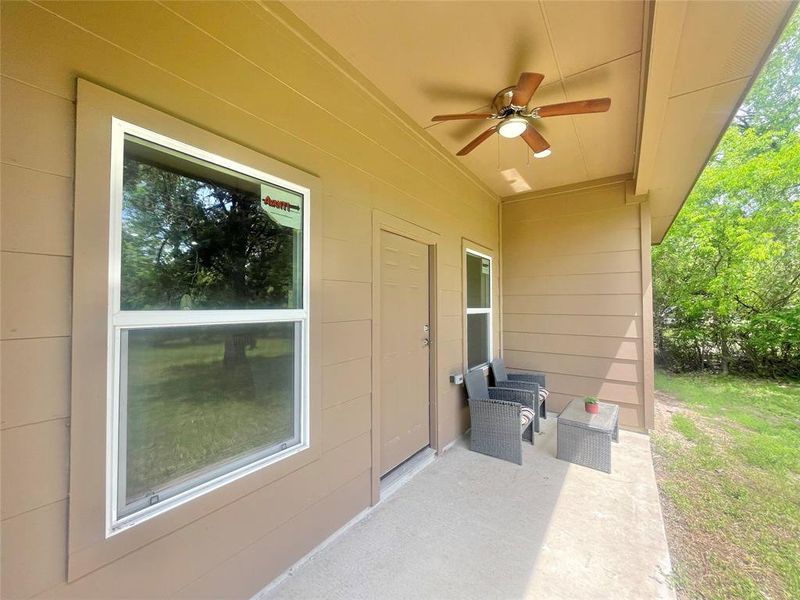 View of patio with ceiling fan