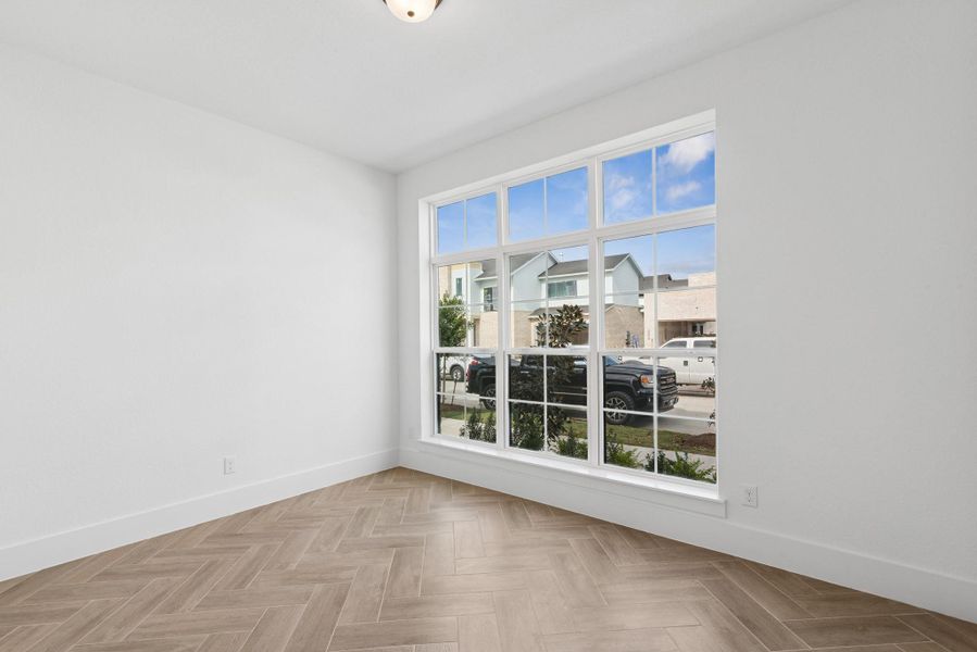 Spacious, unfurnished interior of a new home in Easthaven at Bridgeland Central - Vision Collection, Cypress (Image 22).