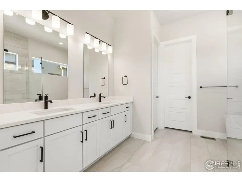 Furnished interior view inside a new home in Festival at RainDance, Windsor (Image 7).