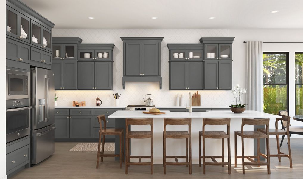 Kitchen with pendant lighting and glass upper cabinets