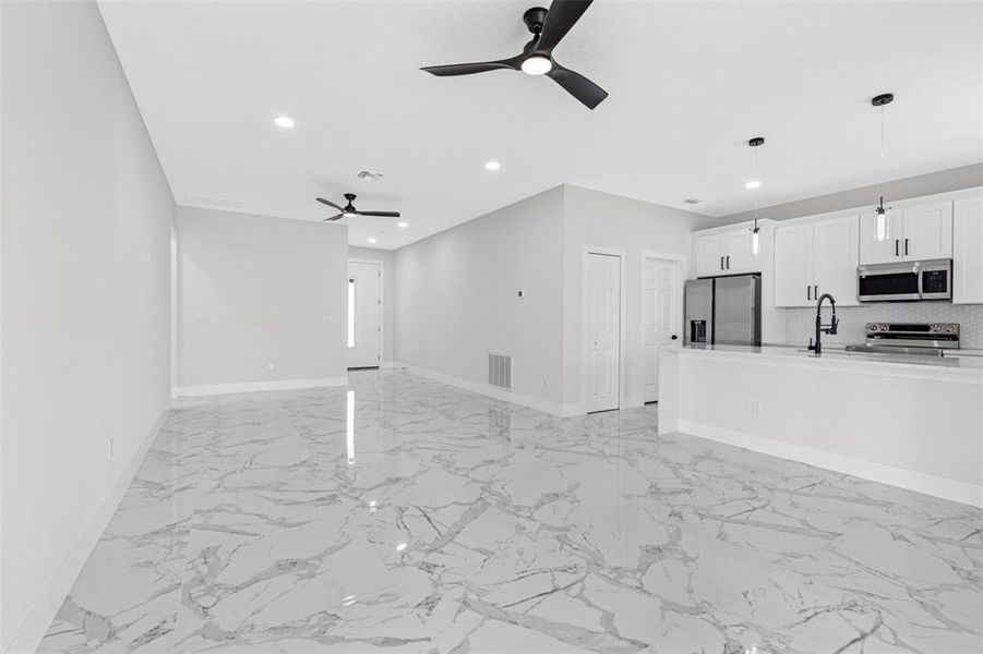 Spacious, unfurnished interior of a new home in , Port Richey (Image 37).