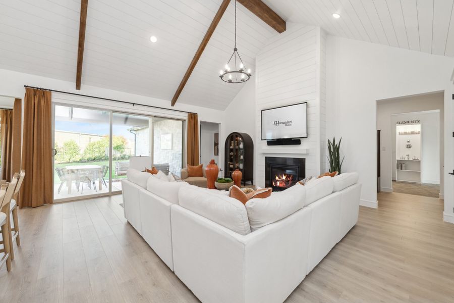 Great room with stained ceiling beams and vaulted ceiling Great room with stained ceiling beams and vaulted ceiling