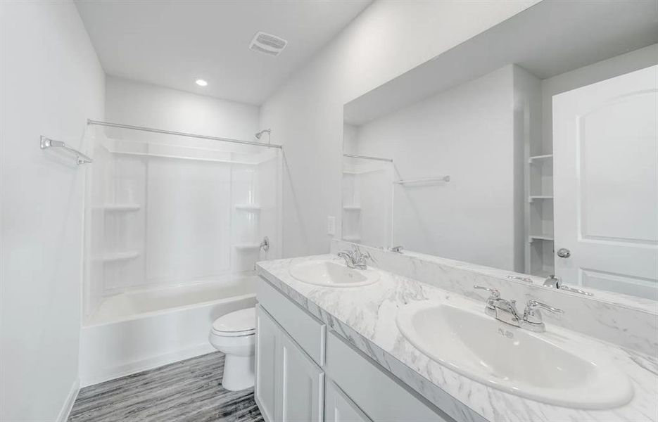 Furnished interior view inside a new home in Still Water Lake, Godley (Image 17).