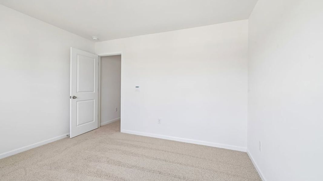 Spacious, unfurnished interior of a new home in Shahbain Reserve, Raeford (Image 37). Spacious, unfurnished interior of a new home in Shahbain Reserve, Raeford (Image 37).