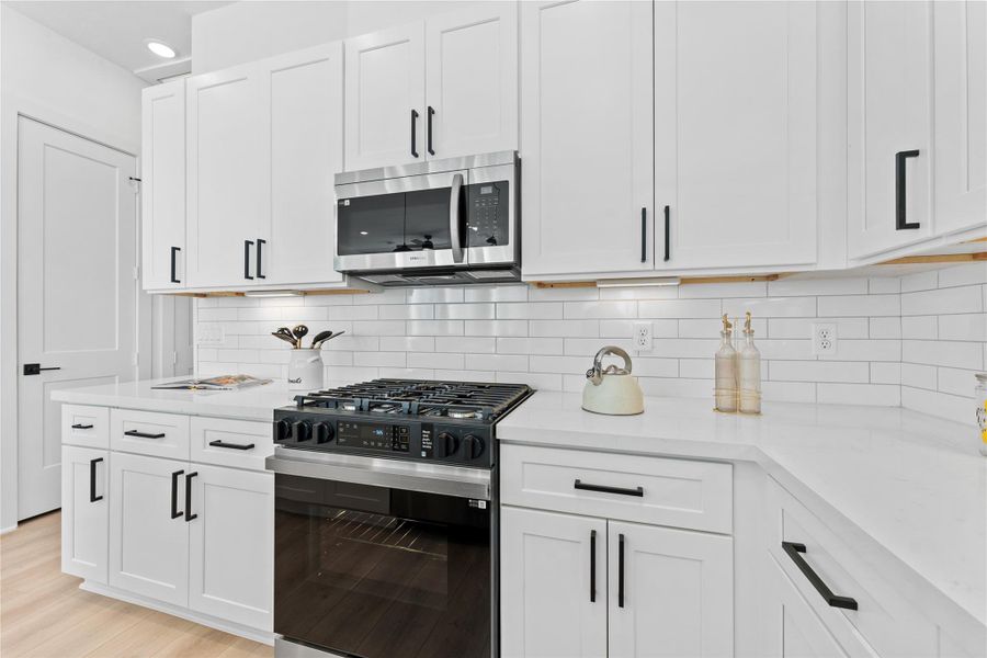 Furnished interior view inside a new home in Jensen Villas, Houston (Image 25).