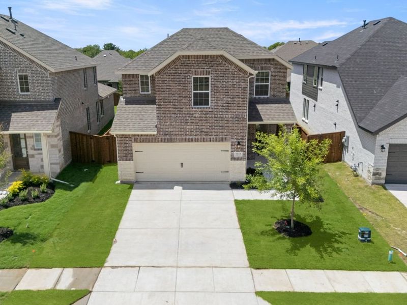 Front exterior of a new home in Creekside, Royse City, TX, highlighting curb appeal (Image 27).