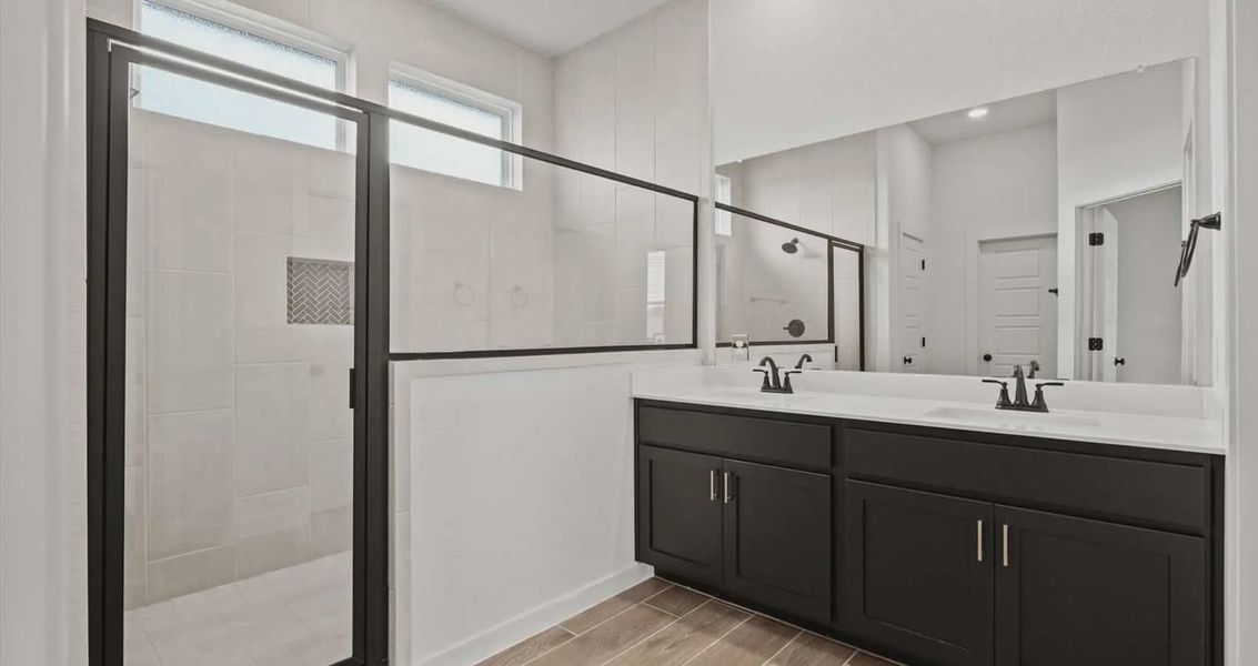 Representative furnished interior of a home built from the Rhyan by Chesmar Homes in Stream Waters, Buda (Image 5).