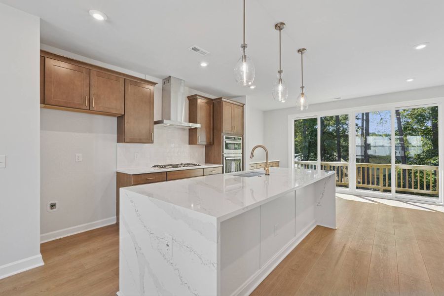 Representative furnished interior of a home built from the Kinston by Tri Pointe Homes in Elm Park, Raleigh (Image 7).