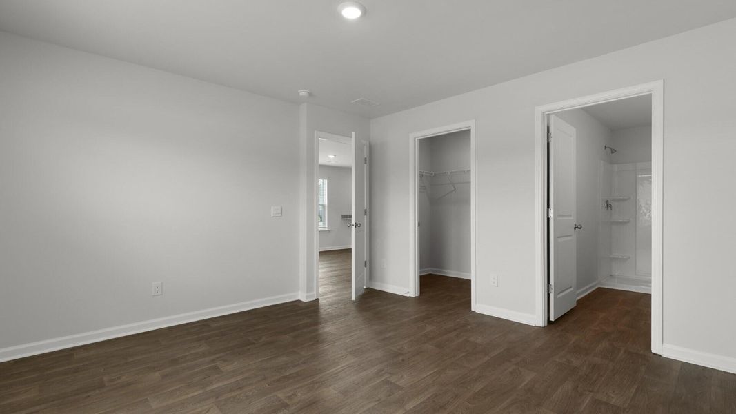 Spacious, unfurnished interior of a new home in Pine Hills Townhomes at Cane Bay, Summerville (Image 26).