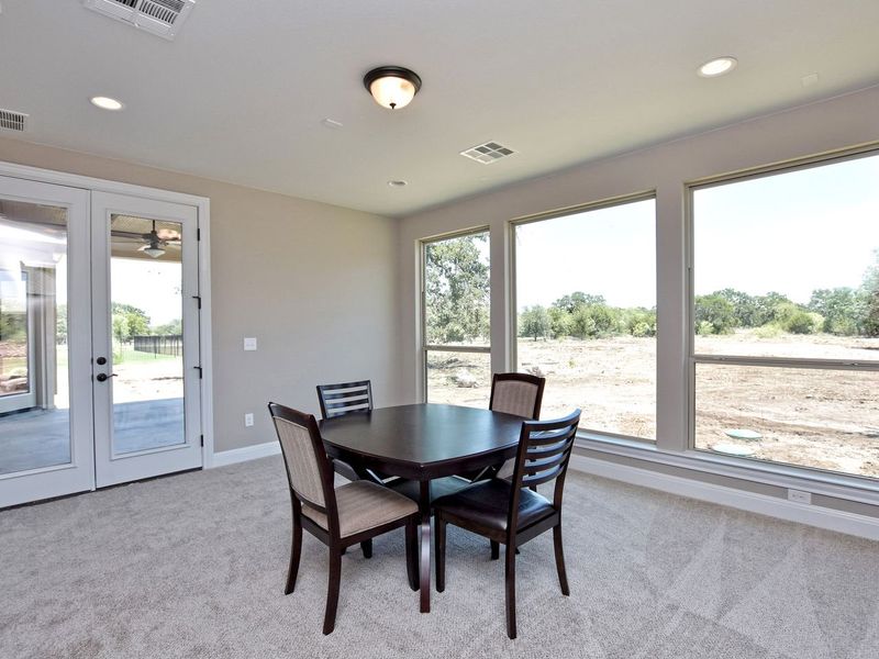 Representative furnished interior of a home built from the San Simeon I by Giddens Homes in Clearwater Ranch, Liberty Hill (Image 263).