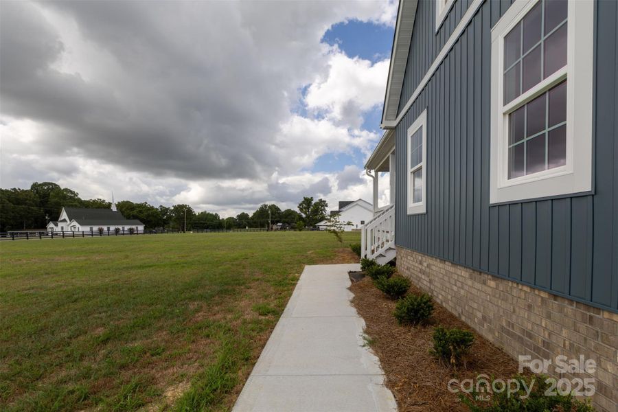 Front exterior of a new home in , York, SC, highlighting curb appeal (Image 22).