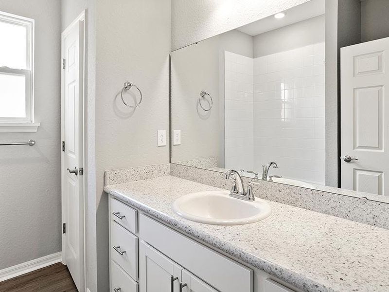 Secondary bedrooms share a full bath - Aubrey by Highland Homes Secondary bedrooms share a full bath - Aubrey by Highland Homes