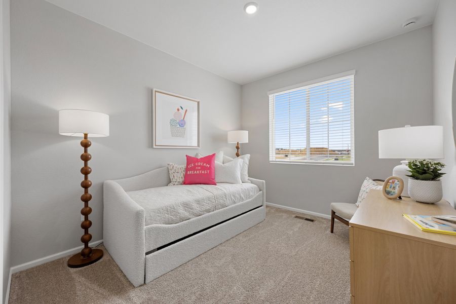 Representative furnished interior of a home built from the 2504 by Risewell Homes in Harvest Crossing, Aurora (Image 27).
